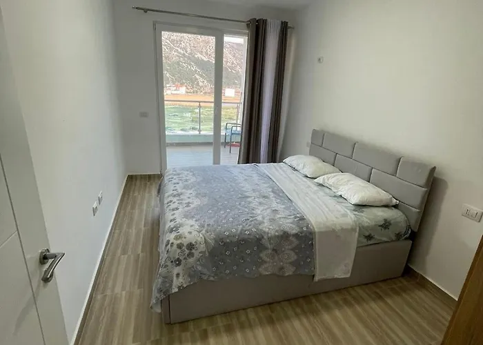 Shengjin Apartamento